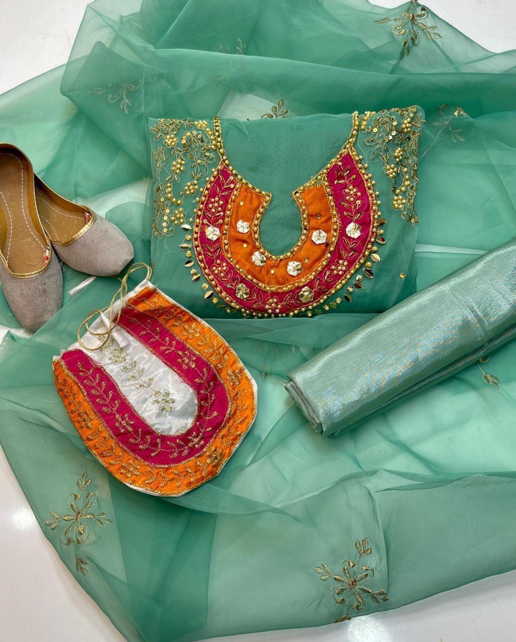5-Piece Unstitched Organza Dress – Tilla Aari Embroidery with Khussa & Bag